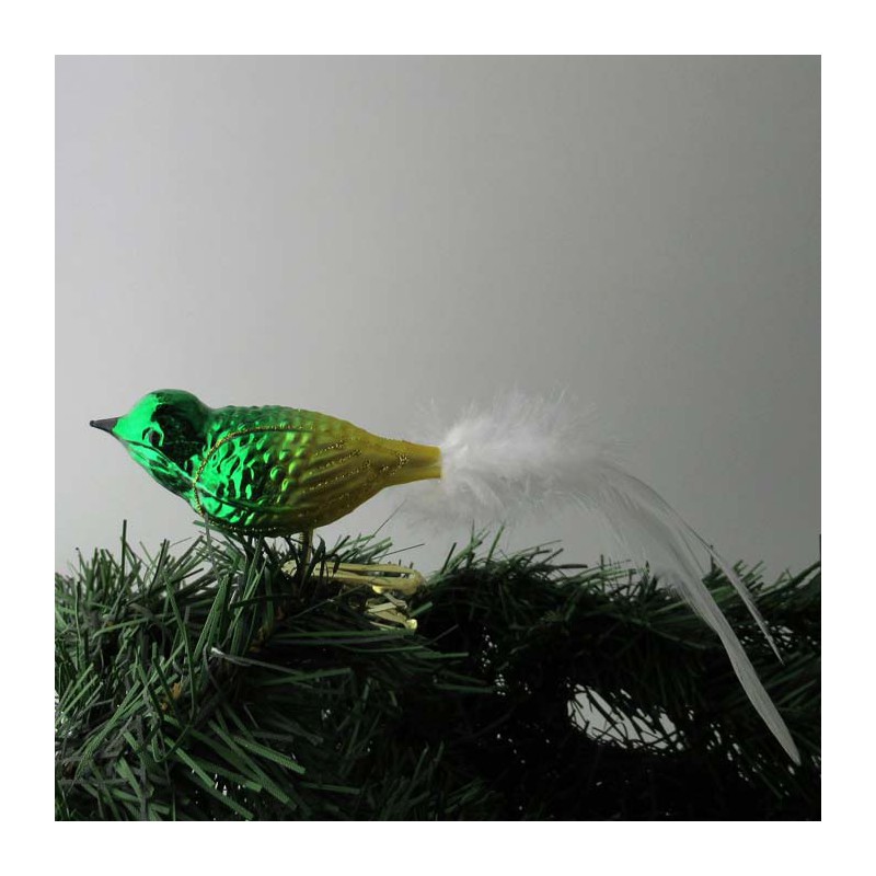 Glasvogel, klein runder Vogel, matt-gold-grün mit weisser Naturfedern